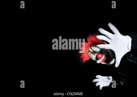 Persona in costume da clown Foto Stock