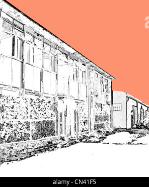 Cielo colorato dietro deadpan e brutto industriale edifici britannici dal nord dell'Inghilterra. Foto Stock