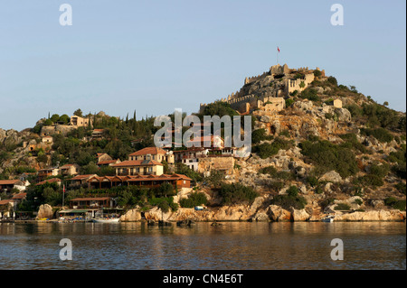 Turchia, Regione Mediterranea, Costa turchese, Lycia, Kekova Bay, vicino a Kas, Kalekoy, veduta del borgo e la rocca Foto Stock