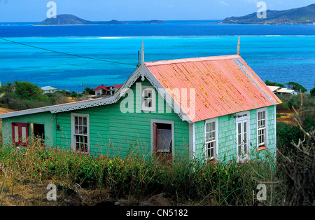 Isola di Grenada, Carriacou, casa locale nella parte anteriore del Petit Martinique isolotto Foto Stock