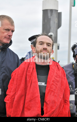 Protester contro l'elitarismo Trenton Oldfield arrestato ma cercando sorrisetto dopo l'arresto del 158 th Oxford versetti Cambridge Boat Race Foto Stock