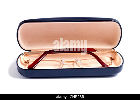 Un bicchieri di colore dorato e caso per loro Foto Stock