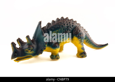 Giocattolo dinosauro di plastica su bianco Foto Stock