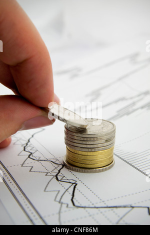 Monete pila sullo sfondo di business Foto Stock
