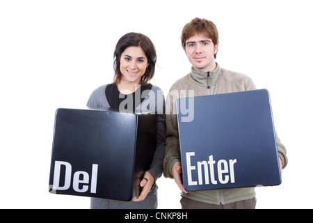 Coppia giovane con l'invio e i tasti Canc Foto Stock