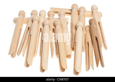 Pila di Dolly vestiti in legno pioli Foto Stock