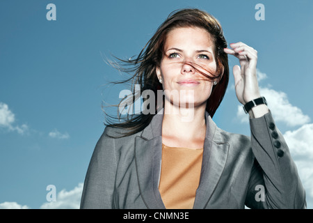Close up imprenditrice sorridente Foto Stock