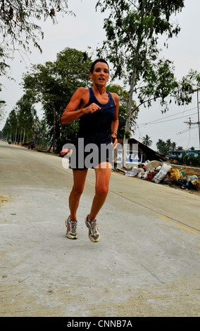 Hash House Harriers o guide di hash, membri della bangkok hashers su una corsa a Bangkok, in Thailandia Foto Stock