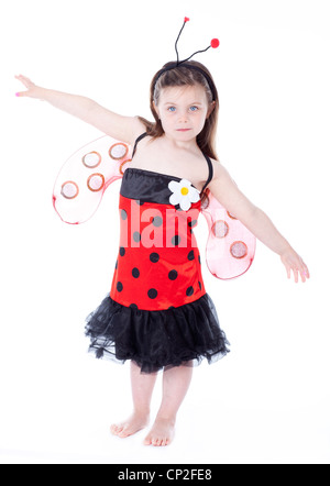 Adorabile bambina in costume coccinella Foto Stock