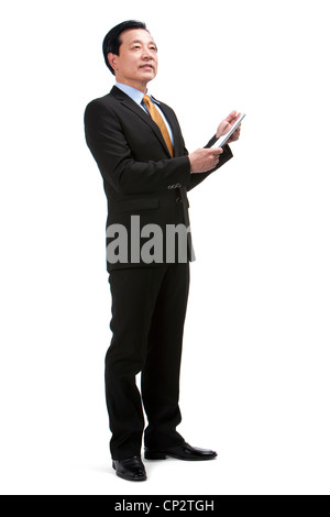 Imprenditore senior con tavoletta digitale Foto Stock