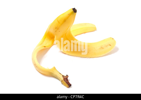 Una buccia di banana sul terreno Foto Stock