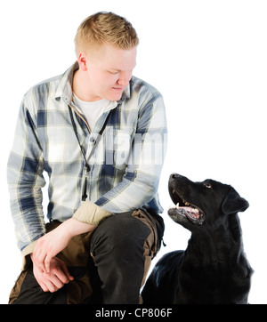 Il proprietario e il labrador cane Foto Stock