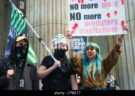 Occupare, Londra uk. anti capitalismo di dimostrazione nel quartiere finanziario, parte di una giornata di azione globale. Foto Stock