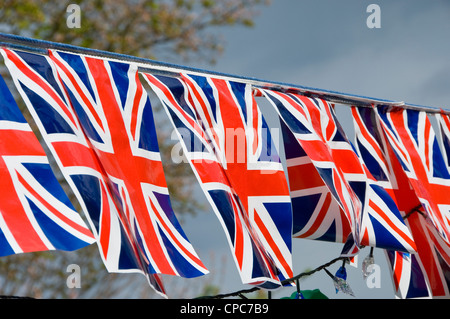 Primo piano delle bandiere Union Jack Jacks che battono in volo Inghilterra Regno Unito Regno Unito Gran Bretagna Foto Stock