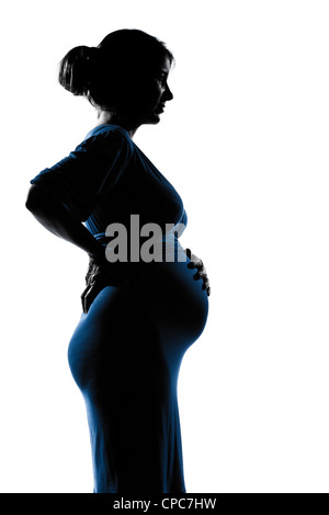 Bella caucasian donna incinta in silhouette su studio isolato sfondo bianco Foto Stock