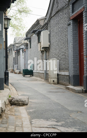 Una poltrona in un hutong di Pechino CINA Foto Stock