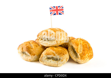 Pila di rotoli di salsiccia con union jack flag su bianco Foto Stock