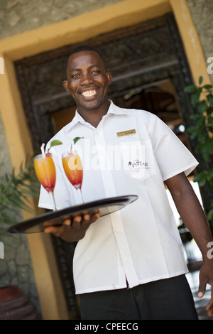 Drink di benvenuto al Matemo lodge nell'arcipelago Quirimbas in Mozambico. Foto Stock