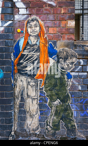 Graffiti figure in Sclater Street London Foto Stock