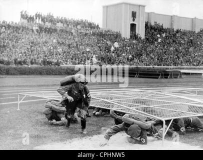 Nazista gioco di combattimento durante il Rally di Norimberga, 1937 Foto Stock
