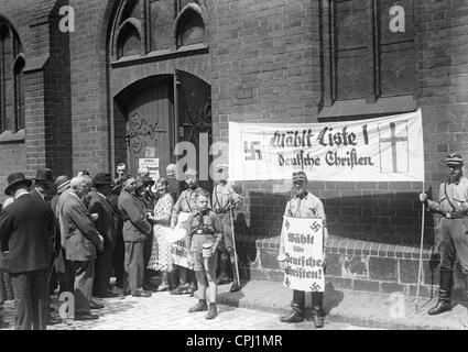 Tedesco cristiani promuovere presso la chiesa evangelica elezioni per voti, 1933 Foto Stock