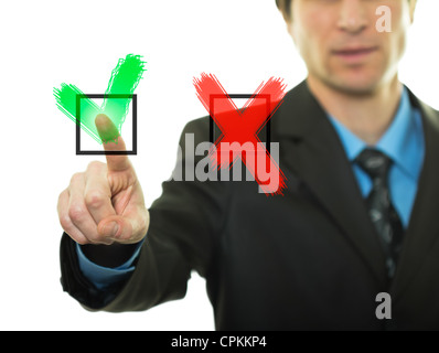 Imprenditore mano premendo i pulsanti Sì/No Foto Stock