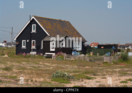 Casa sulla spiaggia di Dungeness Kent Regno Unito staccato Cottages Case Chalets edifici Foto Stock