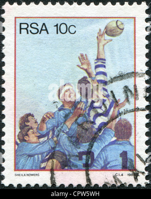 Sud Africa - circa 1983: un timbro stampato in Sud Africa (RSA), è raffigurato il rugby, circa 1983 Foto Stock