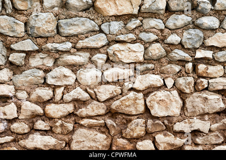 Locale casuale parete in pietra dettaglio - Francia. Foto Stock