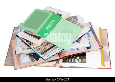 Aperti molti album di foto di famiglia isolato su bianco. Con le patch di ritaglio Foto Stock