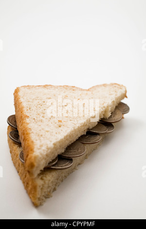 Noi il venticinque per cento delle monete il panino metà Foto Stock