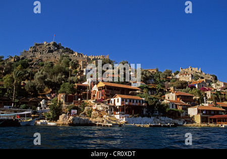 Turchia, regione mediterranea, Lycia, Costa turchese, Kekova Bay, vicino a Kas, Kalekoy, veduta del borgo e la rocca Foto Stock