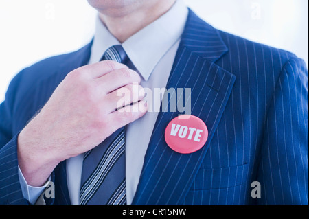 Voto perno sull uomo di bavero Foto Stock