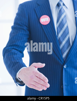 Voto perno sull uomo di bavero Foto Stock