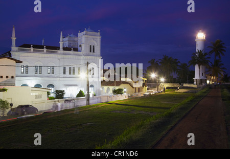 Meeran Moschea Jumma e del faro al tramonto, Galle, sud della provincia, Sri Lanka Foto Stock