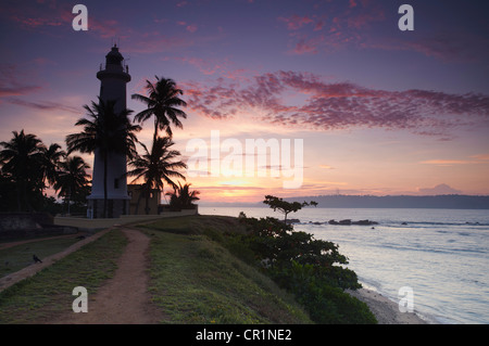 Il faro in Fort all'alba, Galle, sud della provincia, Sri Lanka Foto Stock