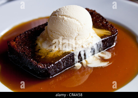 Sticky toffee pudding e gelato Foto Stock