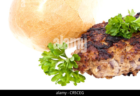 Burger decorate con prezzemolo isolati su sfondo bianco Foto Stock