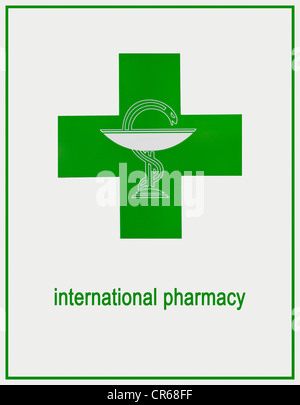 Farmacia Internazionale segno, logo verde con saettone Foto Stock