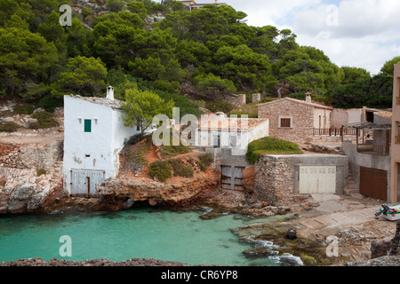 Case di pietra, Cala s'Almunia, costa sud est di Maiorca, isole Baleari, Spagna, Europa Foto Stock