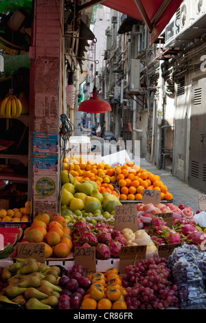 Pressione di stallo di frutta la vendita di ampia varietà di frutti in Hong Kong Foto Stock