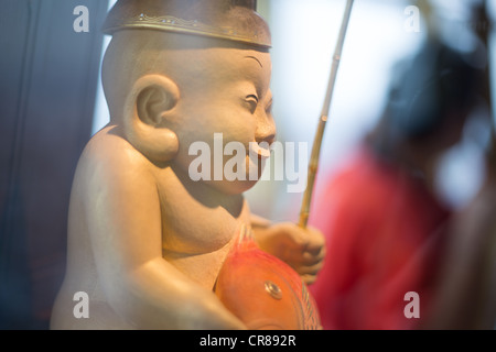 Billiken " Dio ", dio di 'cose come dovrebbero essere', nel quartiere Shinsekai, in Osaka, la regione di Kansai, Giappone Foto Stock