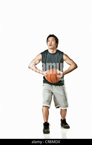 Giocatore di pallacanestro di sfera di trattenimento Foto Stock