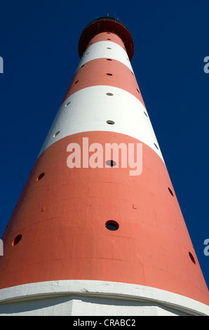 Faro di Westerheversand, il worm-eye, punto di riferimento della penisola di Eiderstedt, Nord Frisia distretto, Schleswig-Holstein Foto Stock