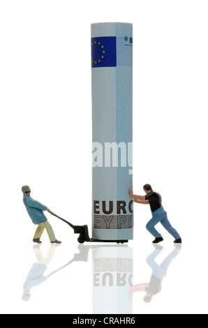 Due lavoratori figure di disegno di un 20-euro bill su un handlift Foto Stock