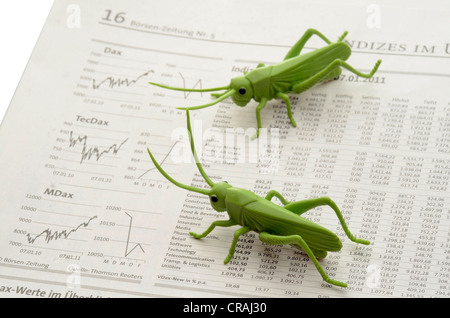 Le cavallette su stock market report, immagine simbolica per le aziende acquisto di altre società allo scopo di liquidare loro Foto Stock