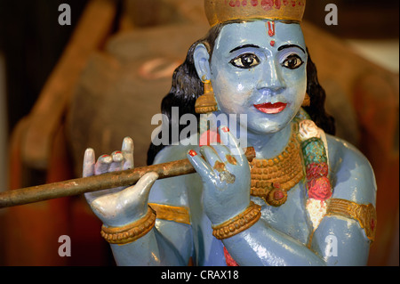 Pastore dio Krishna a giocare il suo flauto, Heritage Hotel Privacy, Lago Vembanad, Kerala, India, Asia Foto Stock
