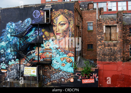 Arte di strada sul lato di un edificio nel centro della città di Manchester. Foto Stock