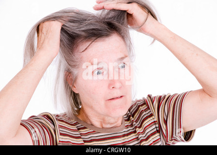 Donna eldely arrabbiarsi Foto Stock