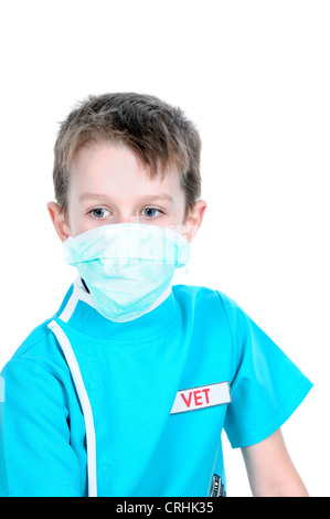 Ragazzo giocando il veterinario. Foto Stock